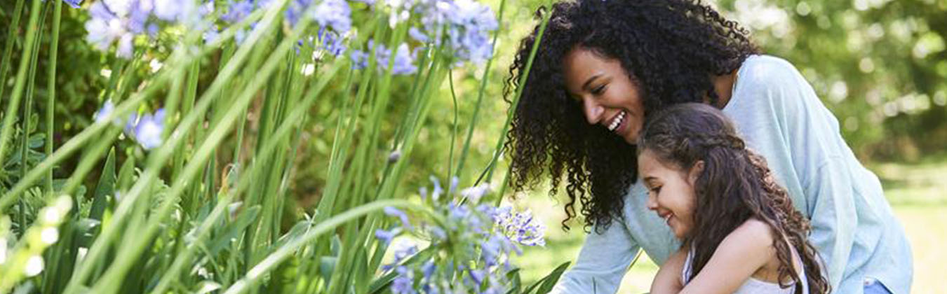 woman and child gardening