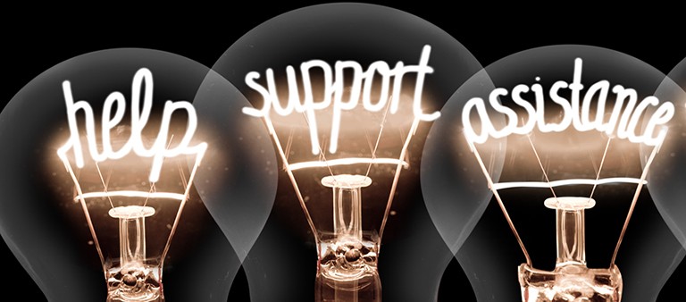 lightbulb with writing help support assistance